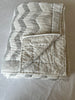 Grey patterned reversible cotton quilt