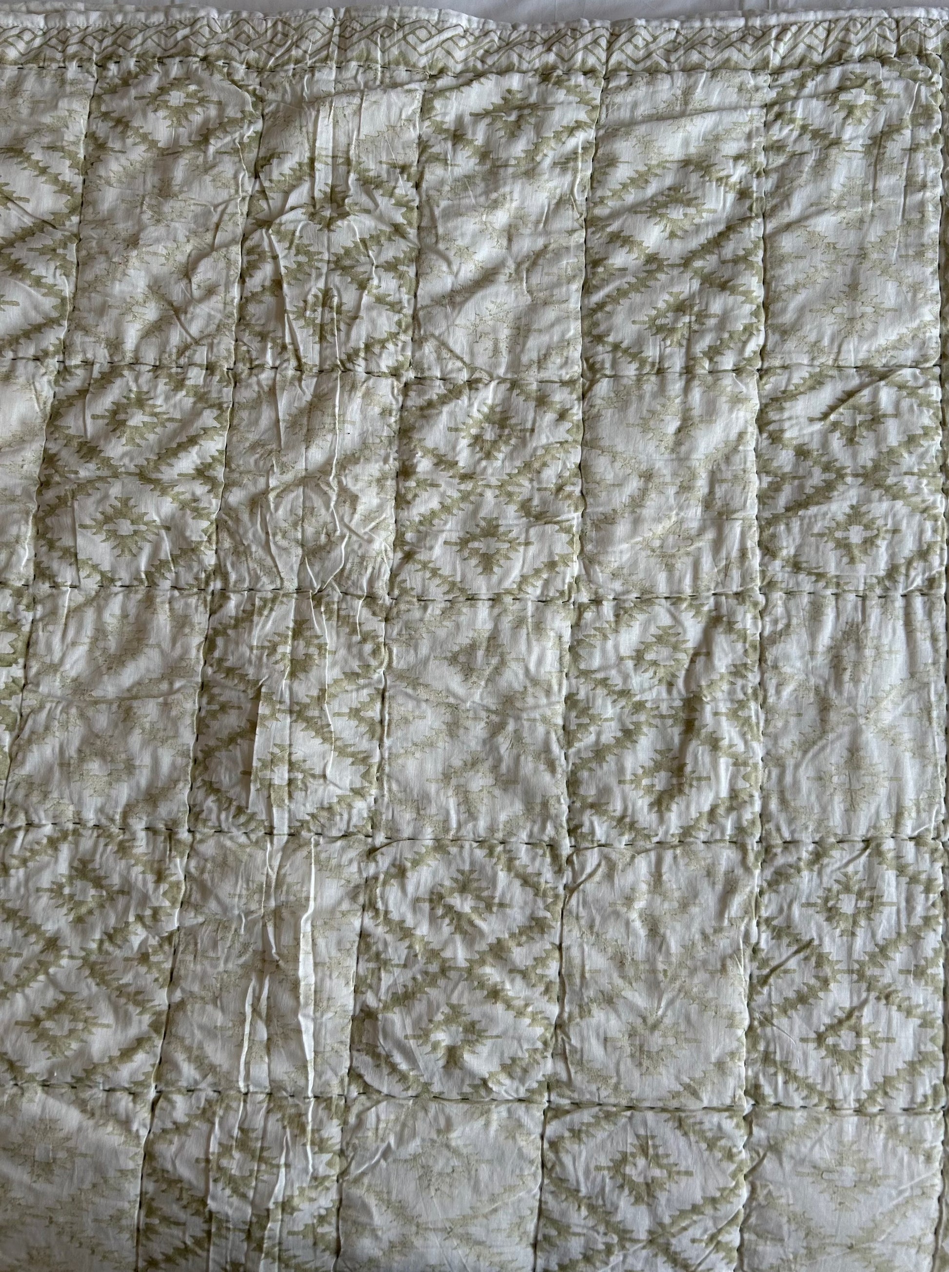 Light green patterned reversible cotton quilt